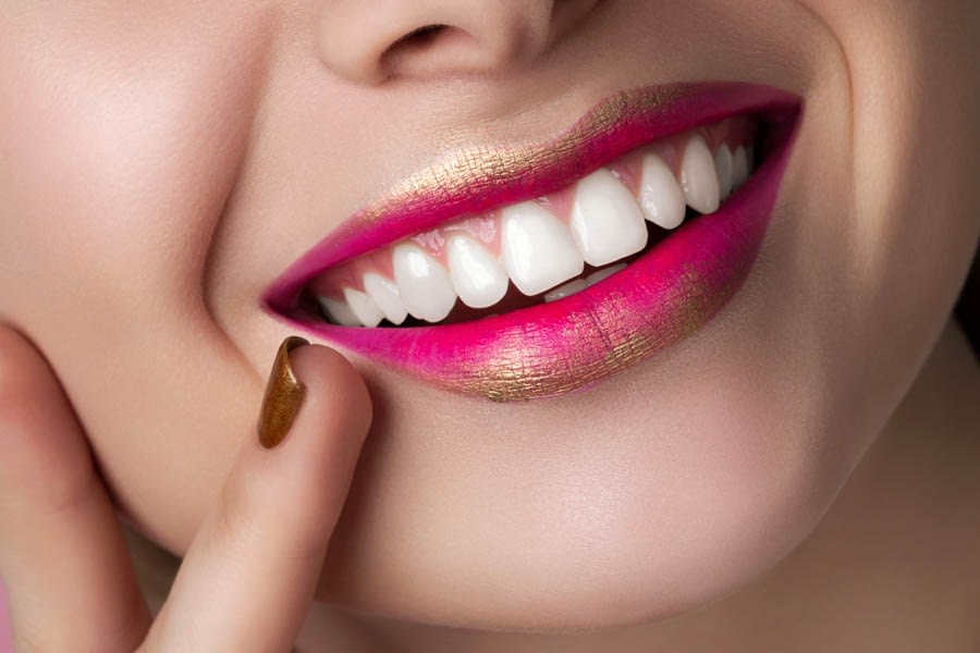 Close up view of beautiful smiling woman lips
