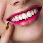 Close up view of beautiful smiling woman lips