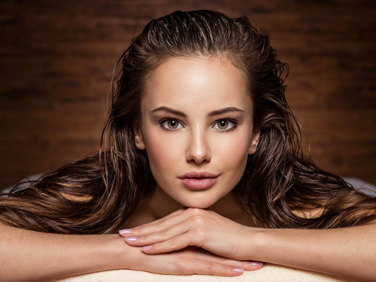 young woman relaxing in spa salon. Beauty treatment. Spa salon